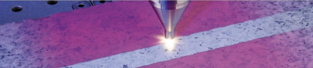 A plasma torch cleaning a surface. 