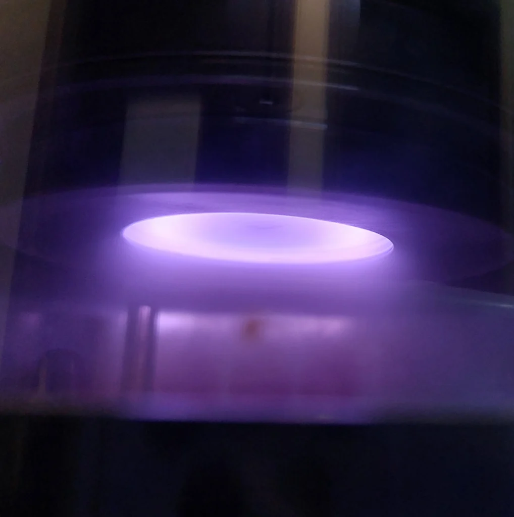 Al target plasma sputtering.