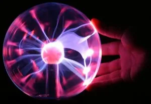 Figure 4. Touching a Plasma Lamp, Electrons Tend to Discharge through the Body Touching a Plasma Lamp, Electrons Tend to Discharge through the Body